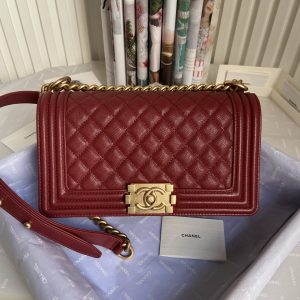 BOY CHANEL HANDBAG Shiny Grained Calfskin & Gold-Tone Metal red 5.9 × 9.8 × 3.5 in