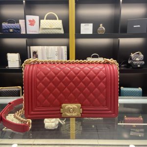 BOY CHANEL HANDBAG Shiny Red Grained Calfskin & Gold-Tone Metal 5.9 × 9.8 × 3.5 in